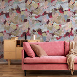 Wall Blush SG02 Petunia Wallpaper featuring in modern living room with pink sofa and wooden furniture.

