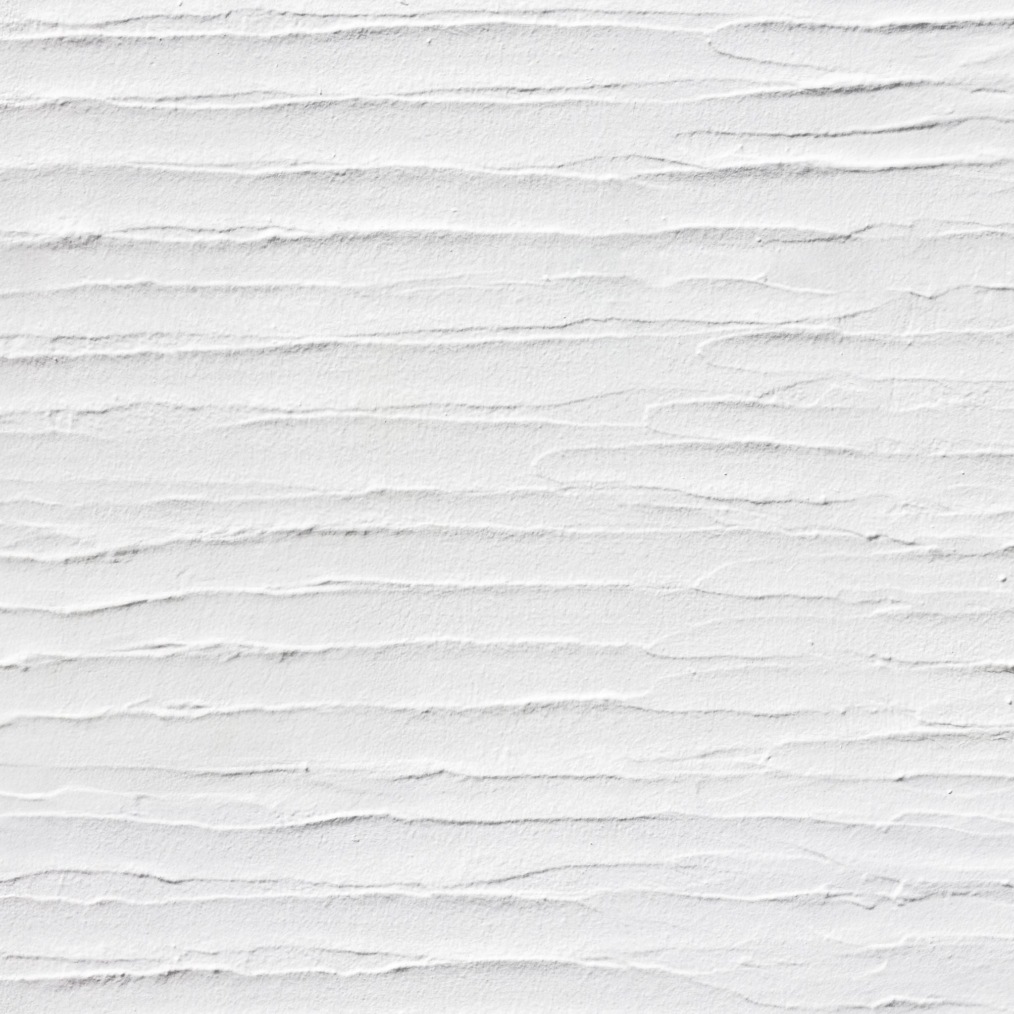 "Plaster Perfect Wallpaper texture by Wall Blush, installed in a modern living room, white embossed design."