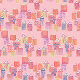 Dream House Wallpaper by Wall Blush in a bedroom, whimsical pastel houses pattern focus.