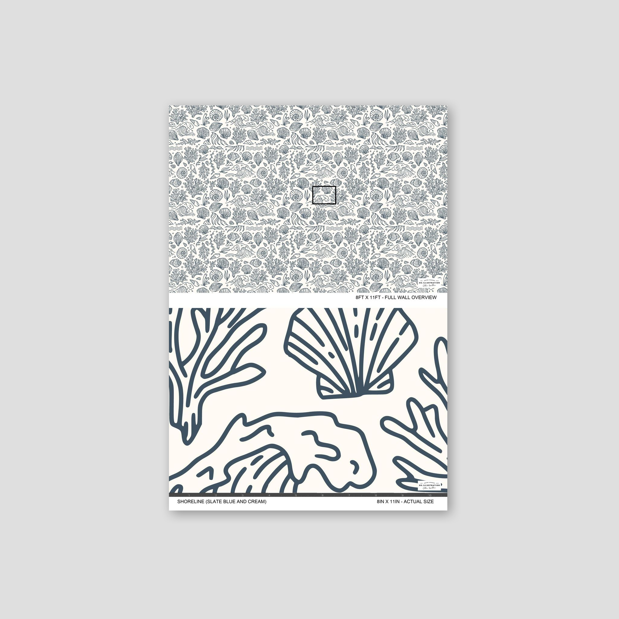 Slate blue and cream shoreline motif wallpaper with seashells and coral.
