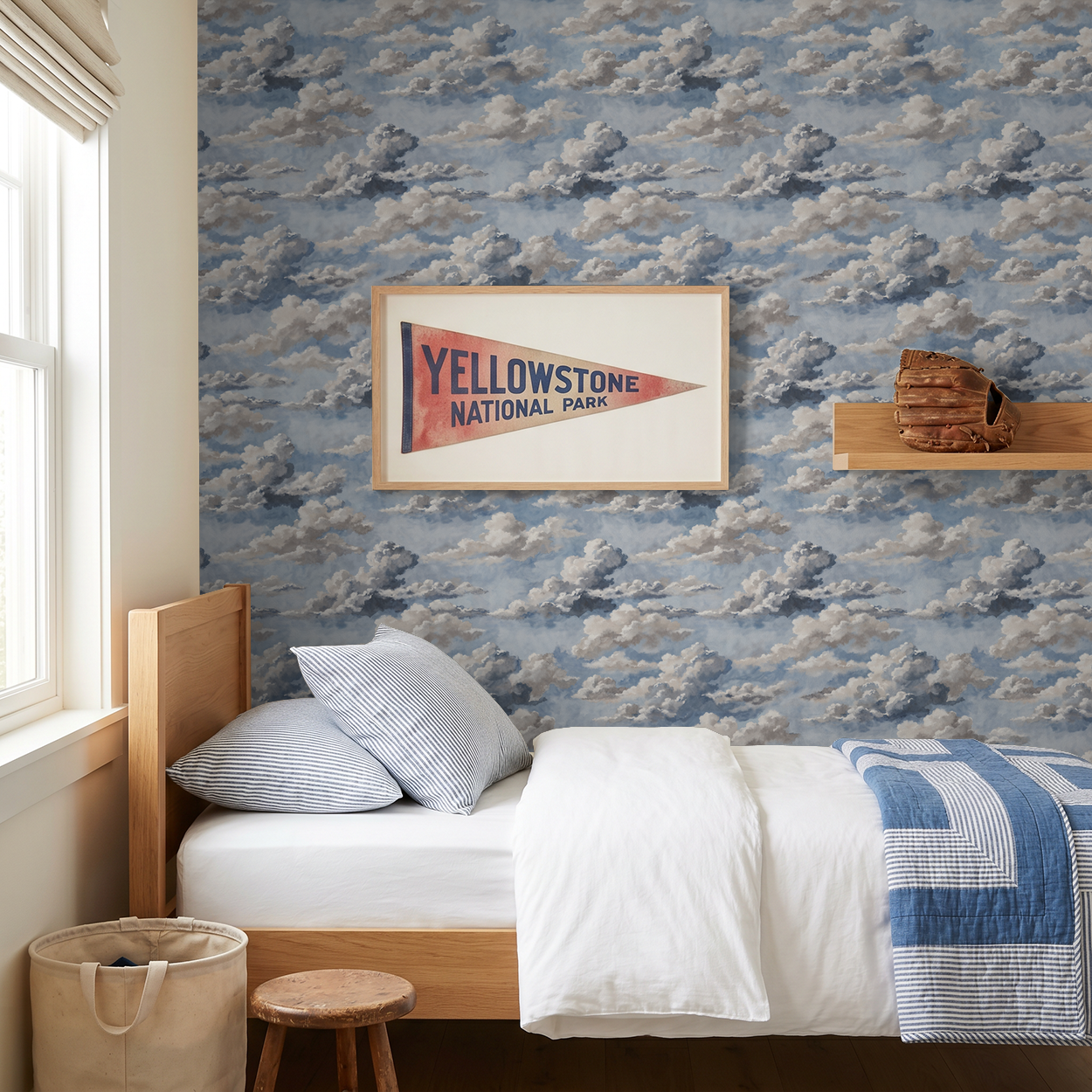 Skyphoria cloud wallpaper in blue and gray in serene bedroom setting with wooden bed.