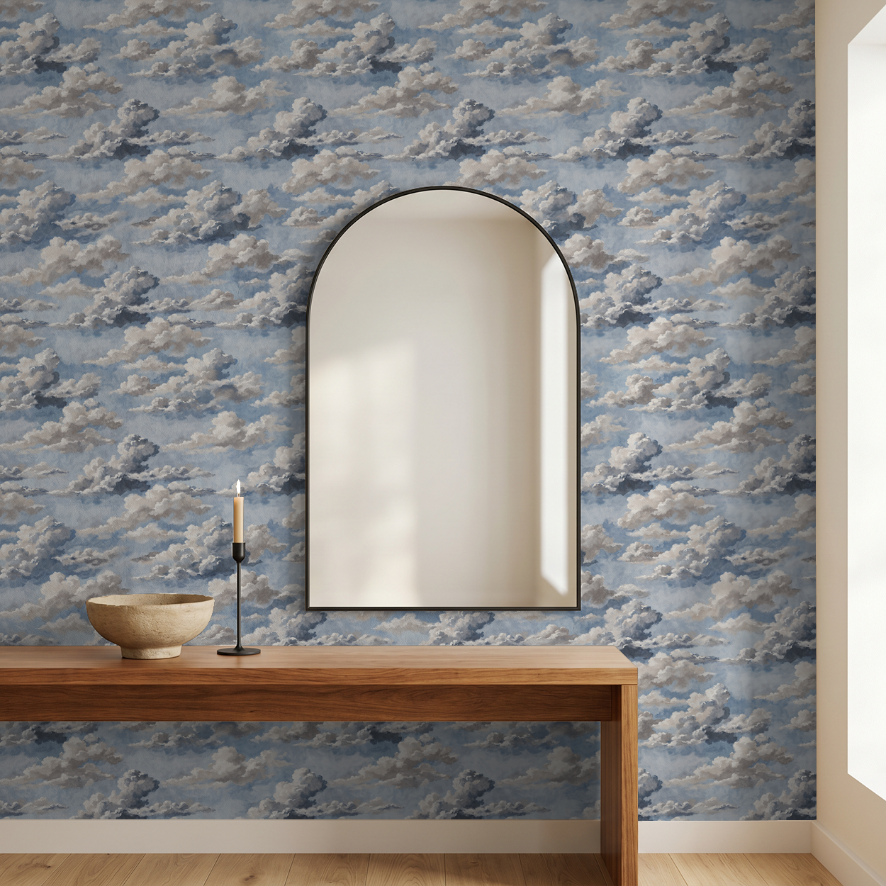 Skyphoria cloud wallpaper with soft blues and grays in a modern room with mirror and wooden table.