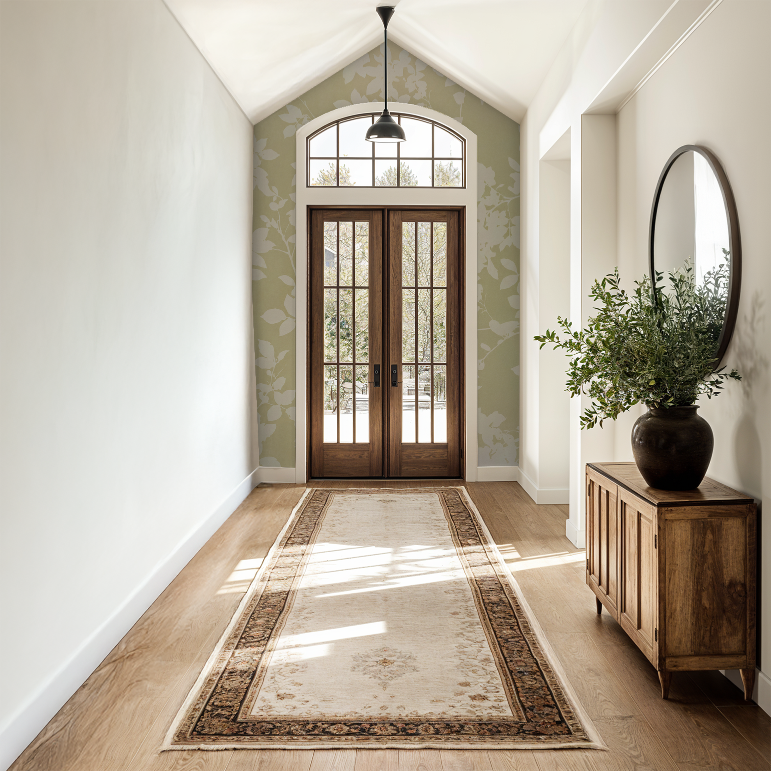 Hallway with soft gold floral wallpaper, wooden doors, and elegant decor.
