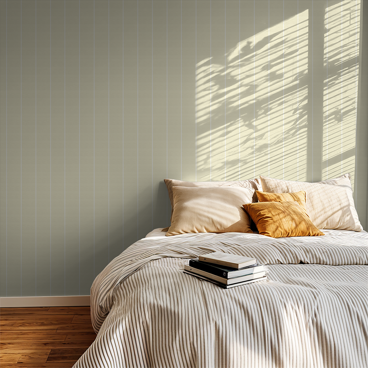 Soft yellow pinstripe dot wallpaper in a cozy bedroom with sunlight and pillows.