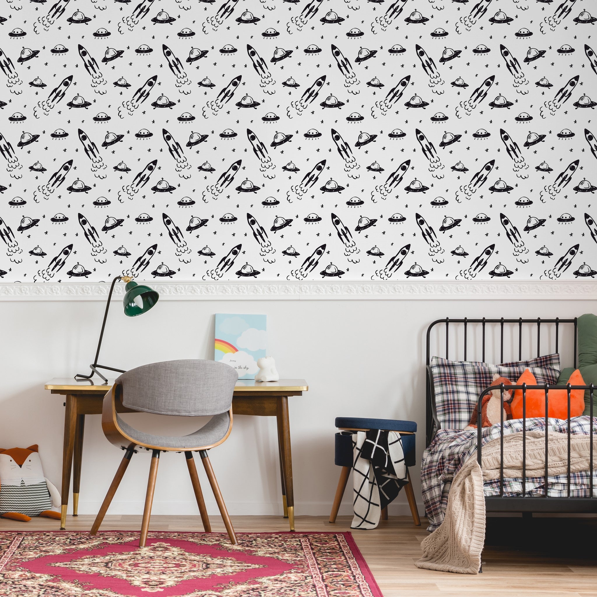 "Child's bedroom featuring Wall Blush's Cosmo Wallpaper with playful spaceship design, highlighting the wall decor."