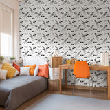 "Cosmo Wallpaper by Wall Blush featured in modern home office with stylish decor, emphasizing the patterned accent wall."