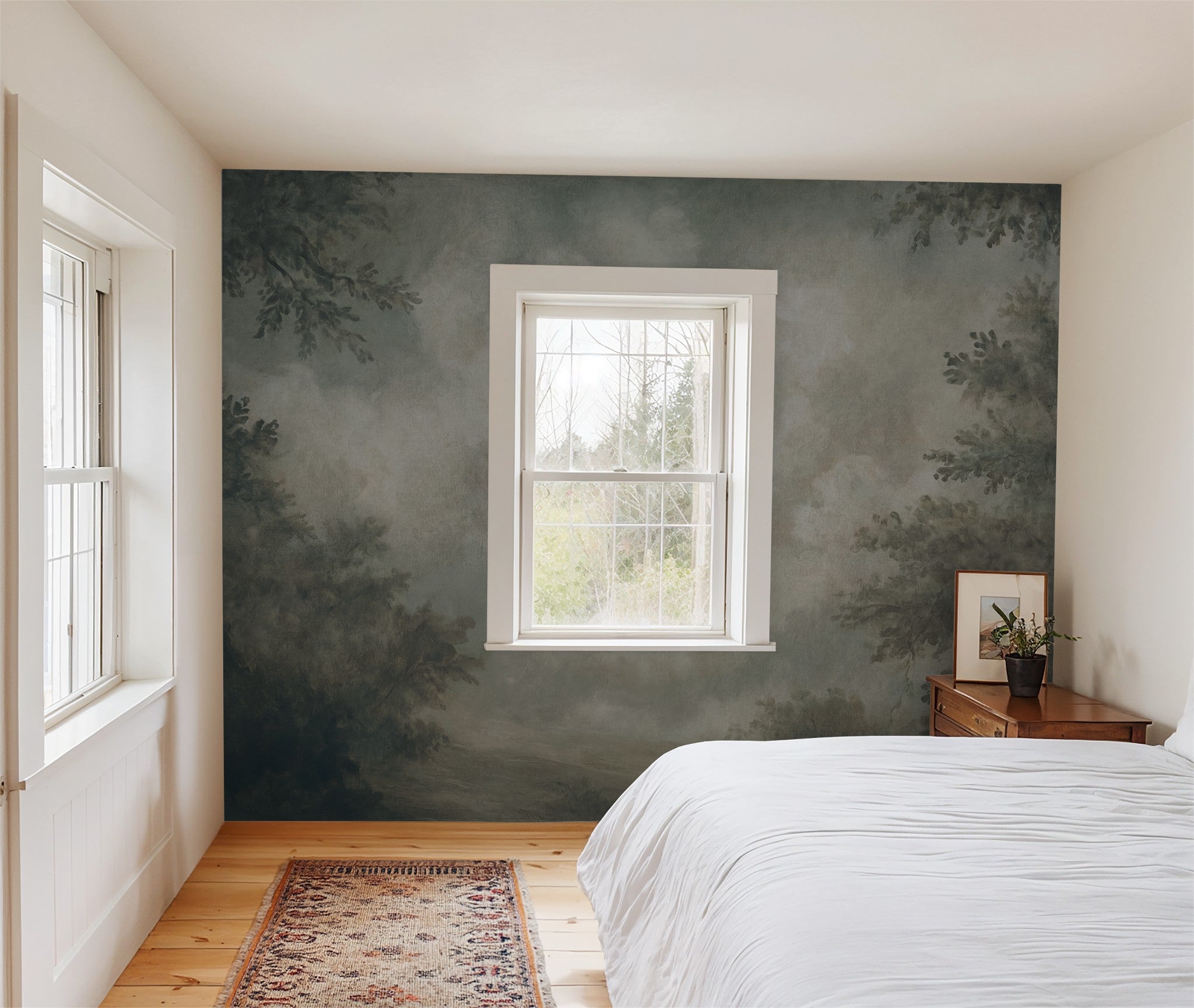 Teal cloud-patterned wallpaper in serene bedroom with wooden furniture.