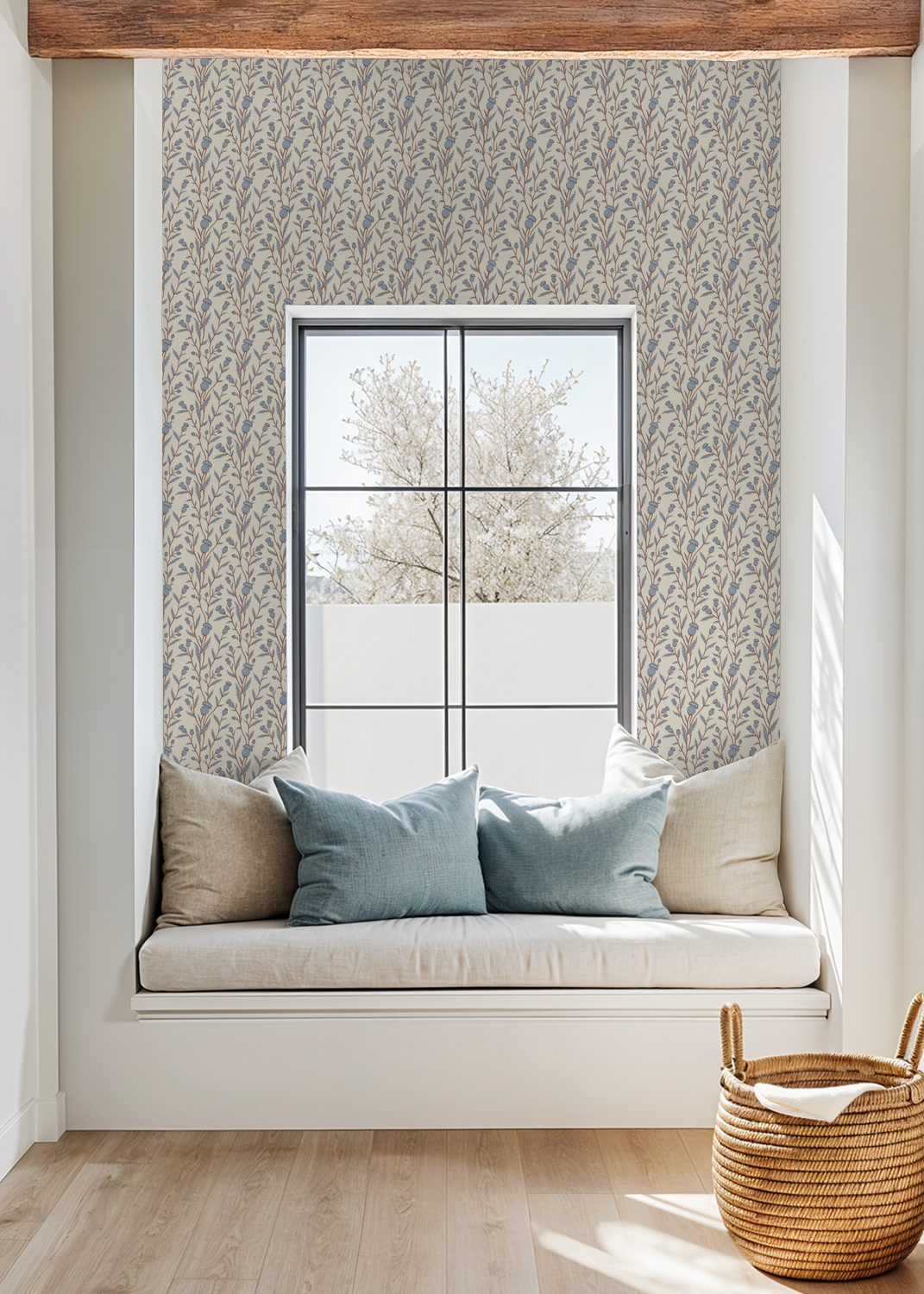 Thistle motif wallpaper in blue and brown in cozy window nook with cushions