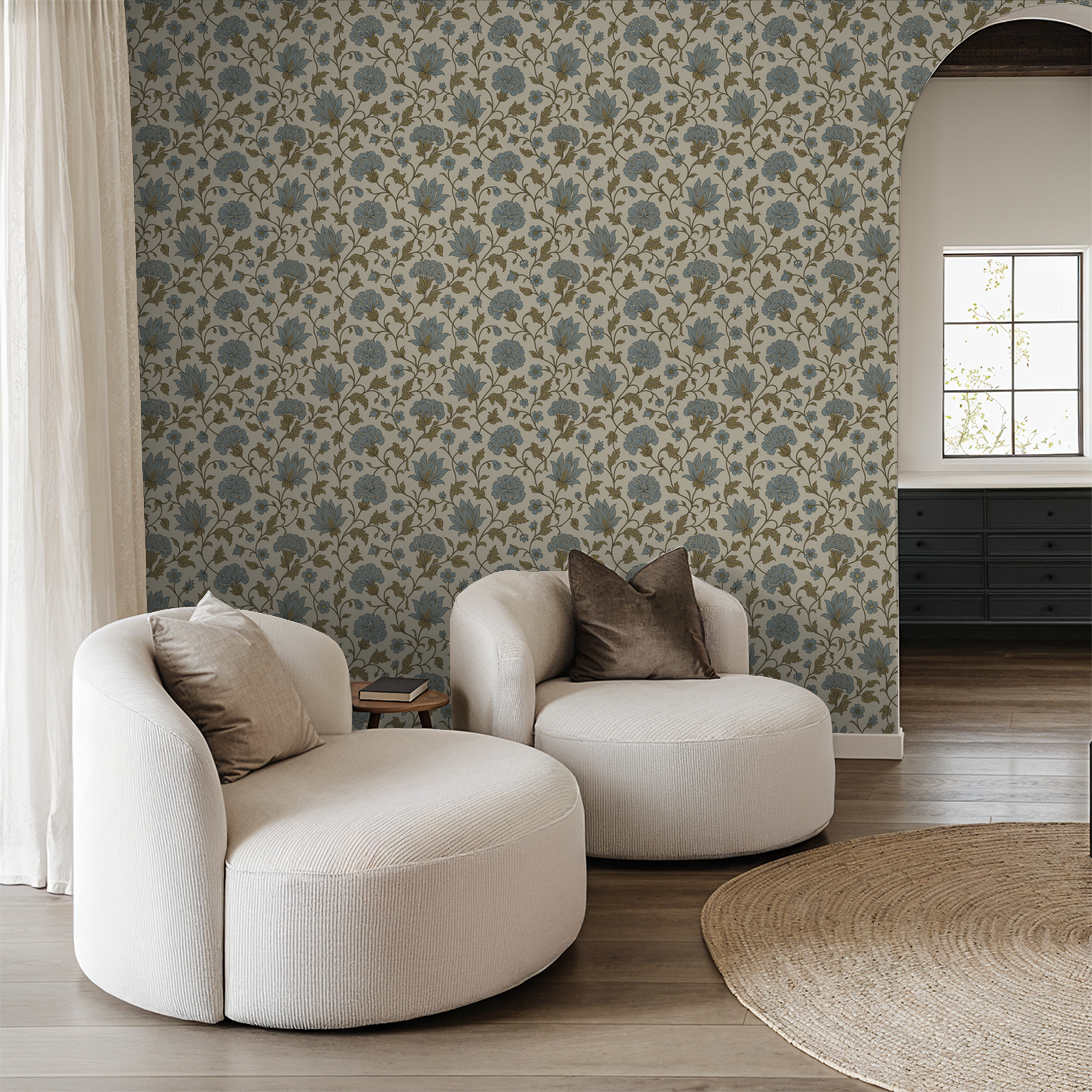 Thornfield Blue floral wallpaper in elegant living room with cream chairs