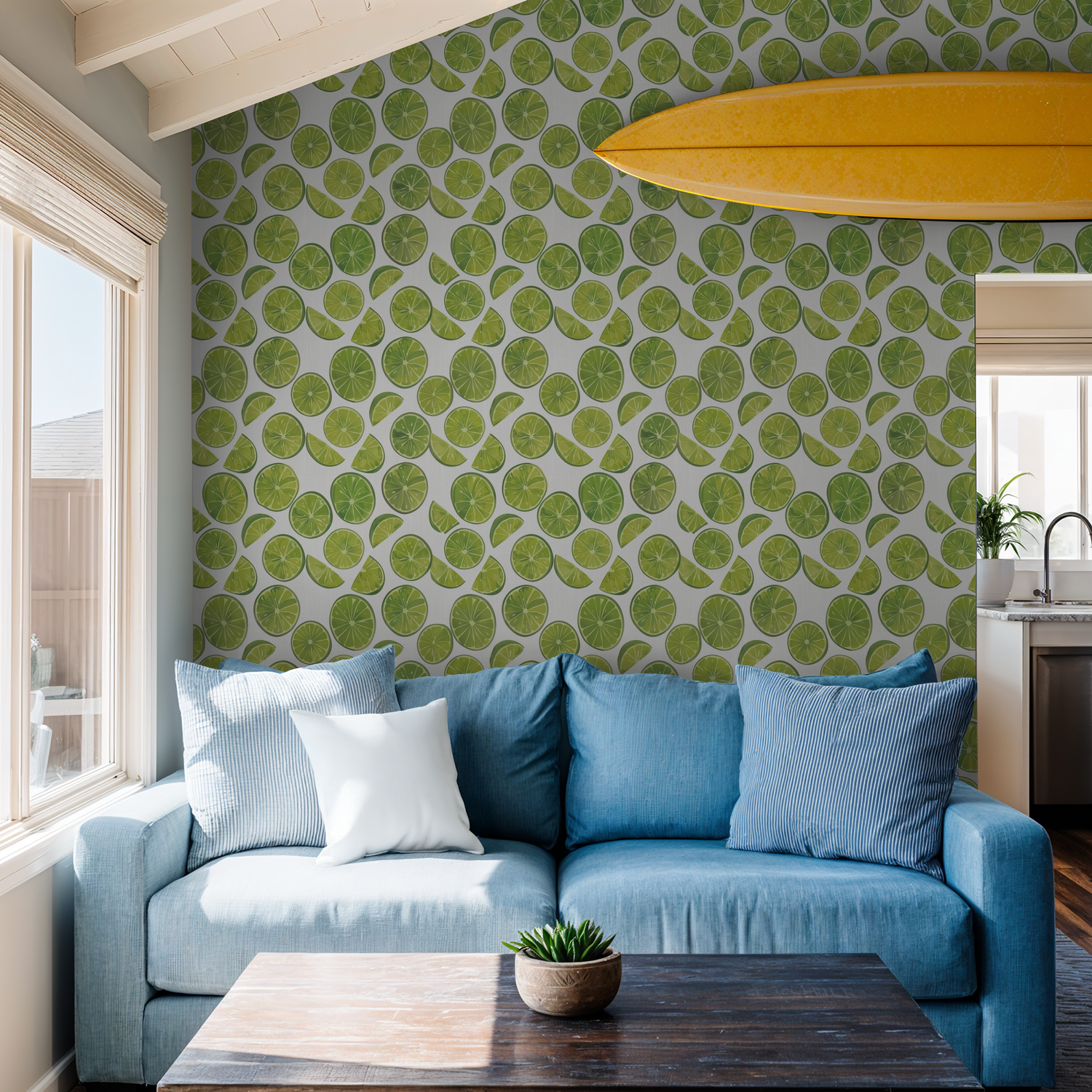 Tropical lime slice wallpaper in a bright living room with blue sofa and surfboard decor.
