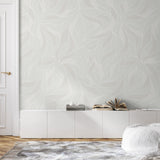 "Wall Blush Angel Wallpaper in a modern living room, highlighting elegant swirl patterns on the feature wall."