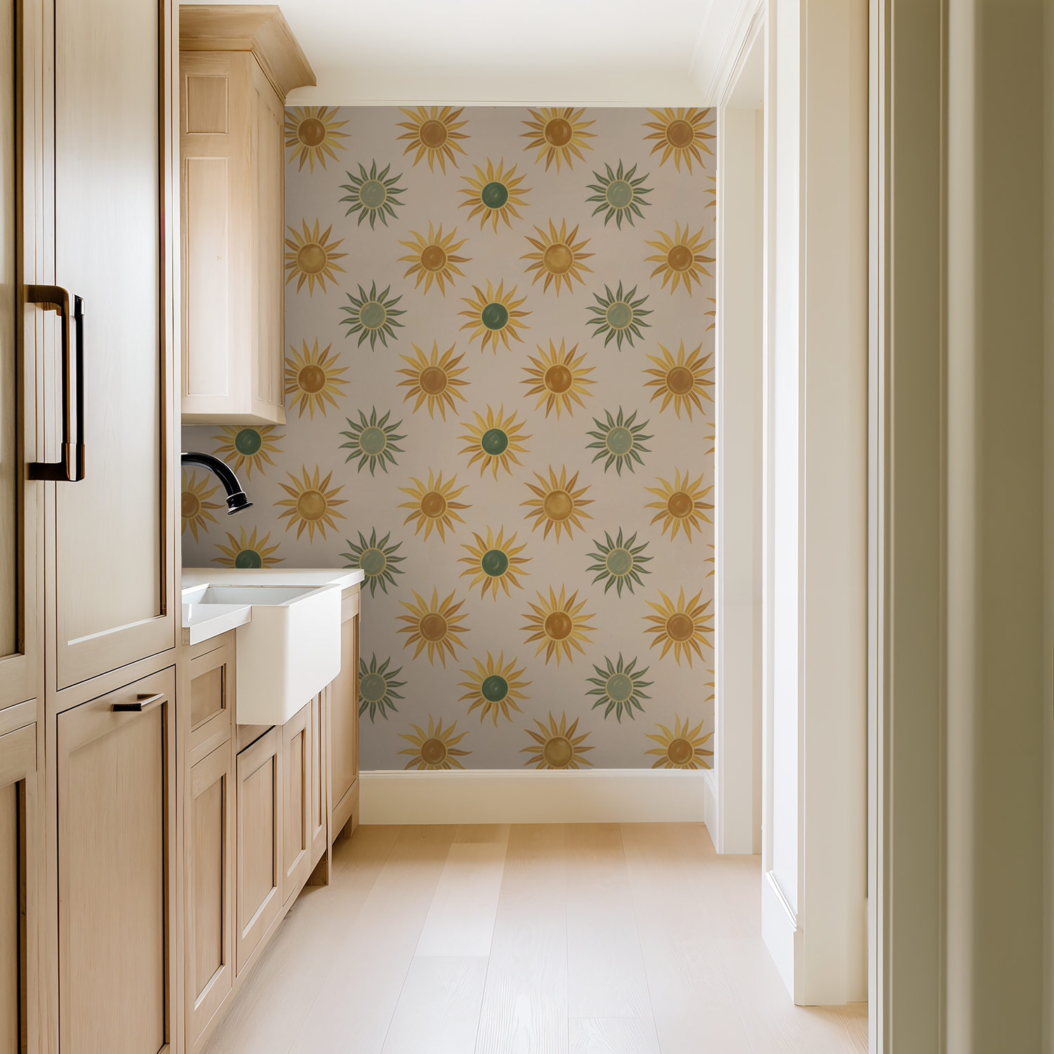 Verano wallpaper with golden suns and green motifs in a neutral kitchen setting