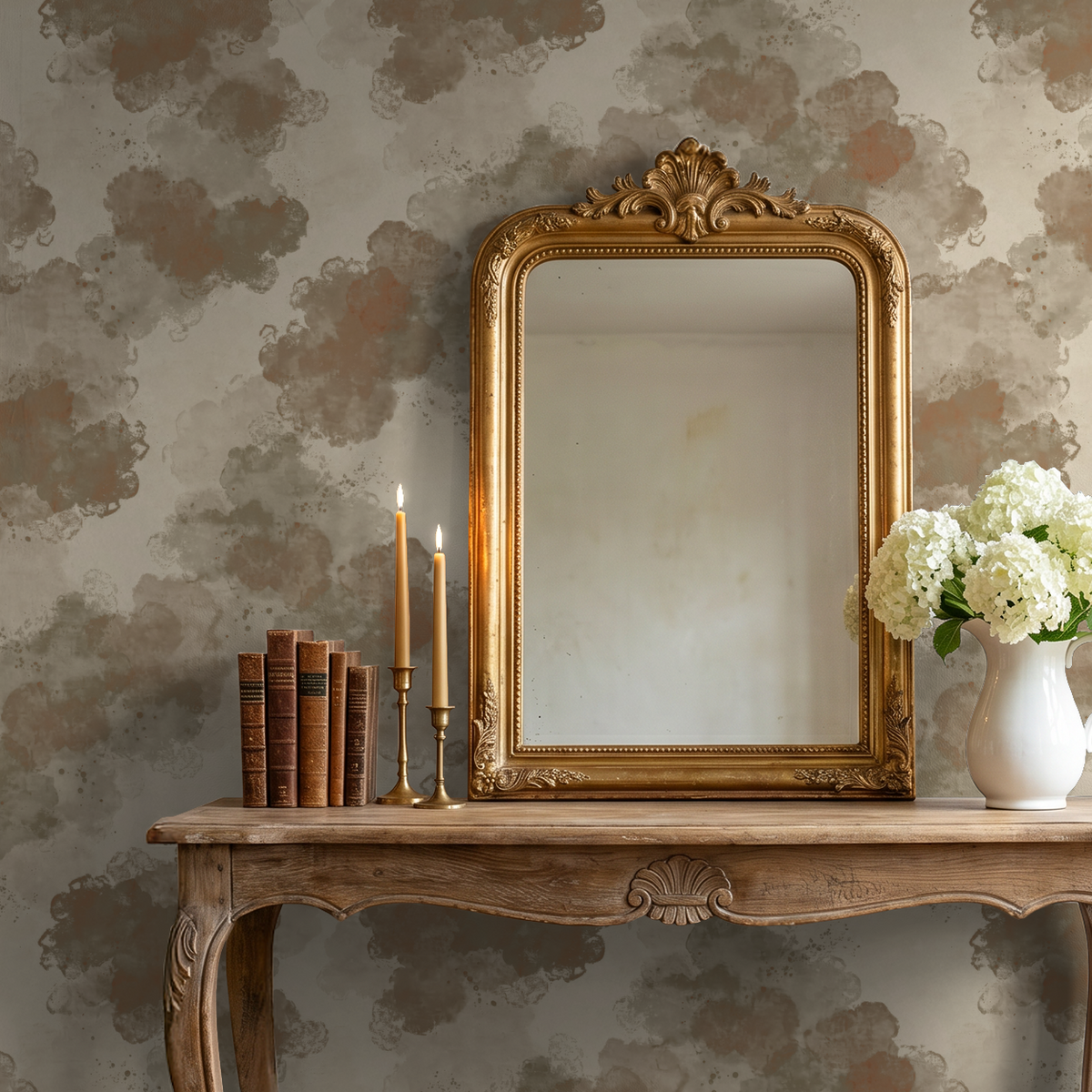 Warm taupe abstract watercolor wallpaper in elegant room with mirror and flowers.