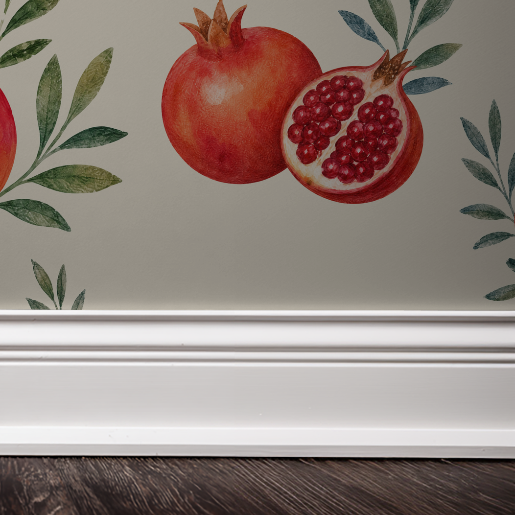 Watercolor pomegranate wallpaper with green leaves on a neutral background