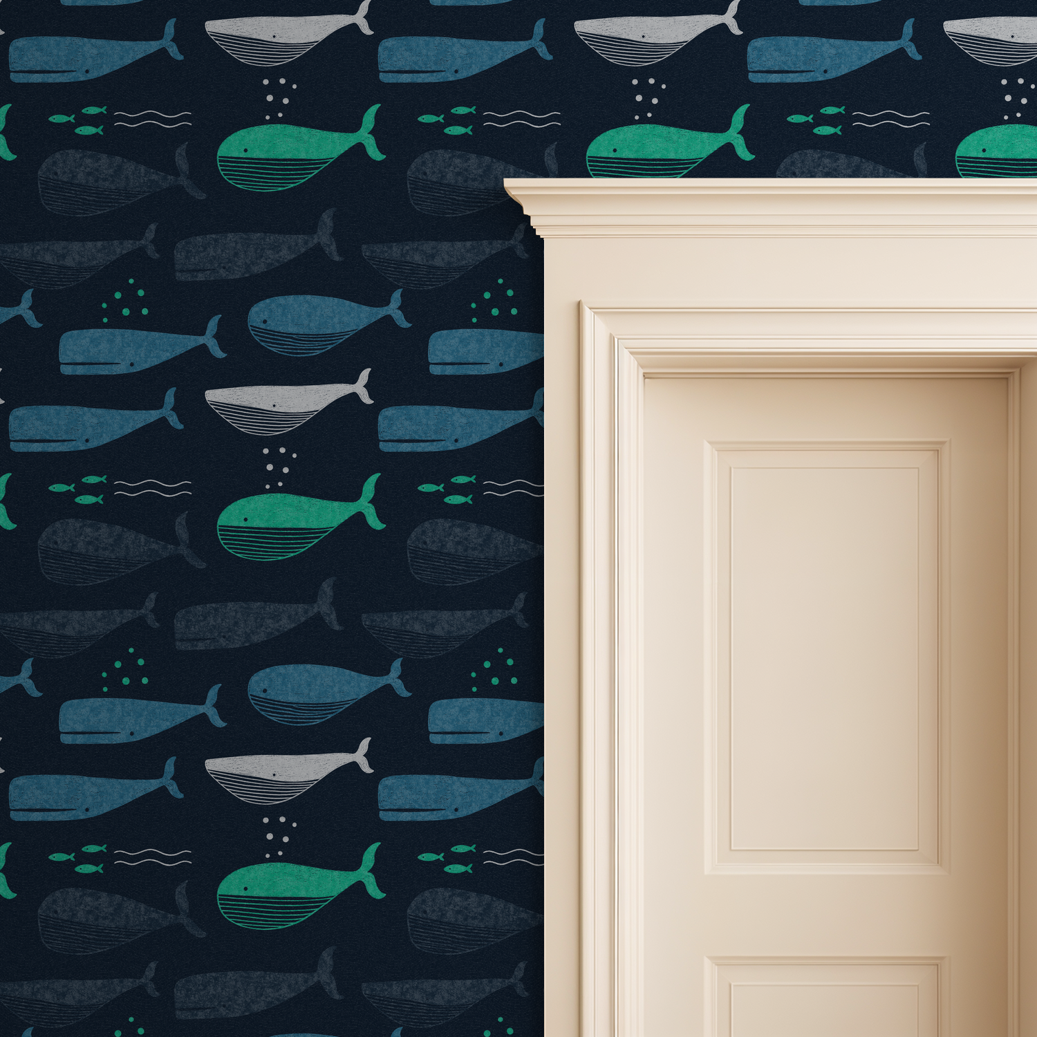 Navy wallpaper with teal and turquoise whales near a cream door frame.