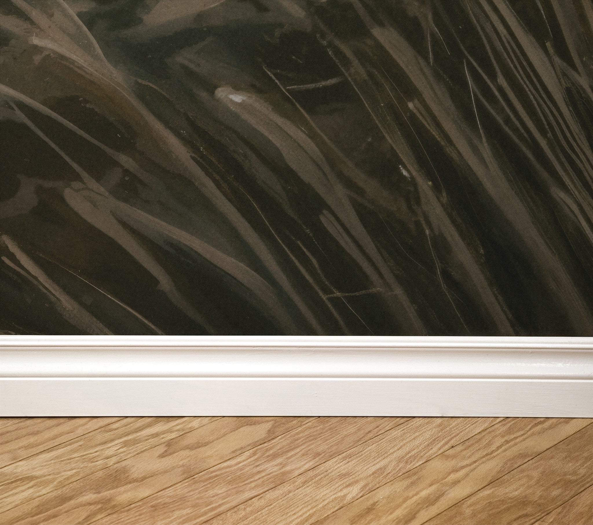 Whispering Wind wallpaper with olive and taupe tones, wood floor and white baseboard