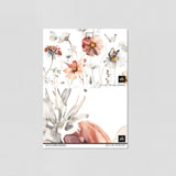 Alt text: "Wall Blush Wildflower Dreams Wallpaper in white showcasing a floral design on a wall, complementing a bright and modern room decor."