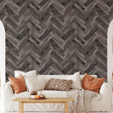 Elegant living room featuring Country Roads Wallpaper by The Tamra Judge Line with herringbone pattern focus.
