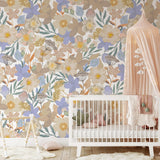 Floral Aurora Wallpaper by Wall Blush in a cozy nursery room, highlighting vibrant botanical design.