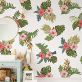 "Vibrant Mahalo Wallpaper by Wall Blush decorating a children's room, showcasing colorful tropical flora."