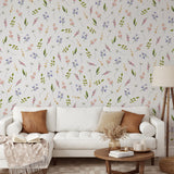 "Wall Blush Bliss Wallpaper enhancing the cozy living room ambiance with elegant floral design."