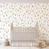 Wall Blush SG02 Bliss Wallpaper in a nursery, floral pattern as the focal point with elegant decor.
