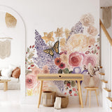 Alt text: "Garden Whimsy Wallpaper by Wall Blush in a cozy living room setup, highlighting the vibrant floral design."