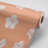Roll of Peachy Perfect Wallpaper by Wall Blush with floral pattern, ideal for a living room focus.