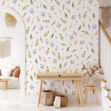 "Wall Blush's Bliss Wallpaper in a stylish living room, showcasing elegant floral patterns as the main décor focus."