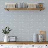 "Baba (Blue) Wallpaper by Wall Blush in stylish kitchen, decor-focused, with utensils and plants."