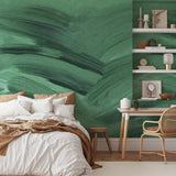 "Wall Blush Emerald Wallpaper featured in cozy modern bedroom, highlighting bold green texture and design."