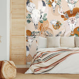 Desert Rose Wallpaper from The Chelsea DeBoer Line in cozy bedroom, elegant botanical and animal motifs.
