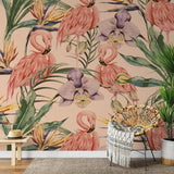 Alt text: "Tropical Flamenco Wallpaper by Wall Blush in stylish living room with accent chair and plant decor."