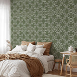 "Gemma Wallpaper by Wall Blush in stylish bedroom, featuring elegant green and white patterned wall focus."