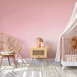 Pretty in Pink Wallpaper from The Clements Crew Line in a Stylish Nursery Room, Emphasizing Soft Wall Hue
