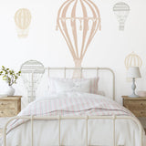 Ellie Mural hot air balloon wallpaper by Wall Blush SG02 in a cozy bedroom.
