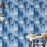 Stylish dining room featuring Wall Blush's Indigo Wallpaper with a modern abstract design.
