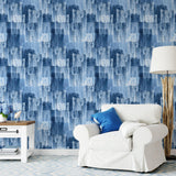 "Wall Blush Indigo Wallpaper in modern living room with stylish white sofa and accent decor."