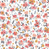Wall Blush's In Bloom (White) Wallpaper featuring floral patterns in a cozy living room setting.
