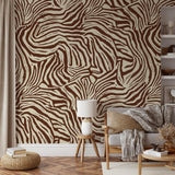 "Jules Wallpaper by Wall Blush highlights a living room with its distinctive tan and white pattern."
