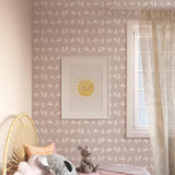 Keen & Clever Wallpaper by The Ania Zwara Line in a cozy bedroom with elegant floral patterns.
