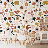 Mila Wallpaper from The Stefanie Bloom Line in a vibrant children's playroom, featuring colorful floral patterns.
