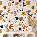 Mila Wallpaper by The Stefanie Bloom Line enhancing a modern living room's decor with vibrant floral patterns.
