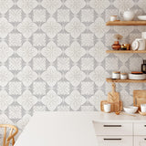 "Stylish Navarro Wallpaper by Wall Blush graces modern kitchen walls, accentuating trendy interior design."