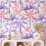 Nim Wallpaper by Wall Blush SG02 in a stylish living room, with a focus on colorful tropical pattern.
