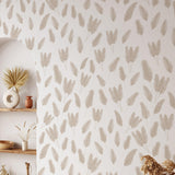 Serena Wallpaper by Wall Blush in a modern living room, showcasing elegant leaf patterns as the main focus.
