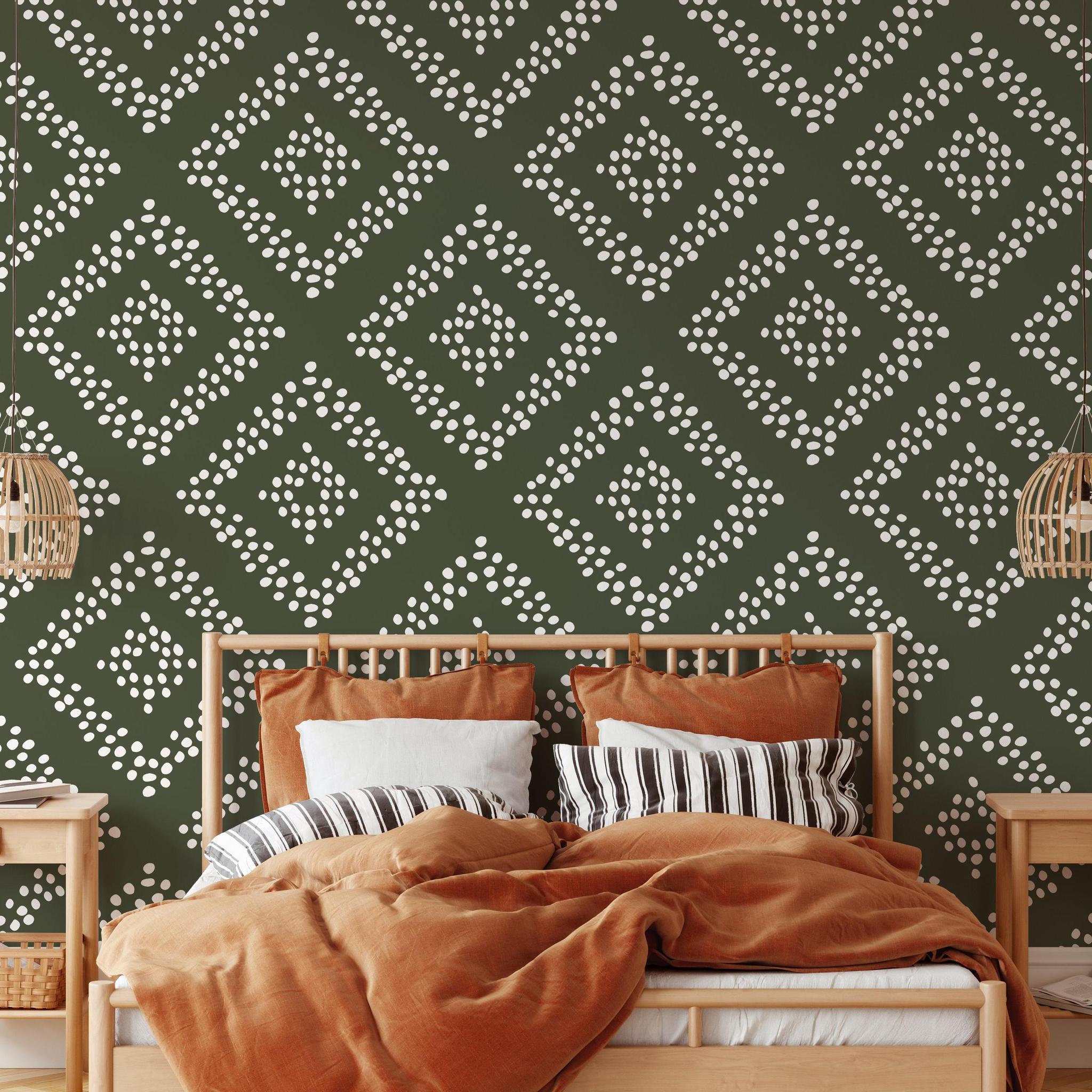 Stylish Jude Wallpaper from The Stefanie Bloom Line in a cozy bedroom interior with decorative bed and accessories.
