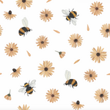 Wall Blush Bumble (White) Wallpaper with floral and bee design for a chic, modern living room.
