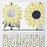 Darla Wallpaper from The Chelsea DeBoer Line, featuring bright sunflower design for vibrant room decor.
