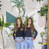 Paradise Wallpaper by The Clements Crew Line in a playful kids' room featuring tropical design.
